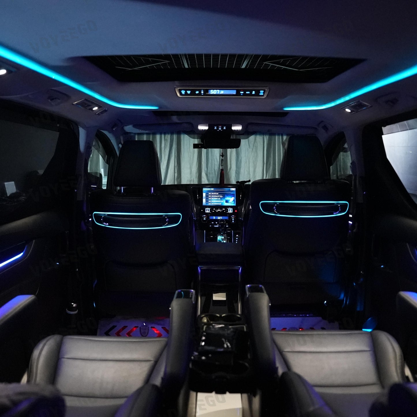 Luxury alphard vehicle interior with illuminated dashboard and rear seats leds
